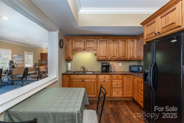 172 Sunny Ridge Rd, Hendersonville, NC 28739 - kitchen featuring ornamental molding, dark countertops, black appliances, dark wood finished floors, and a sink
