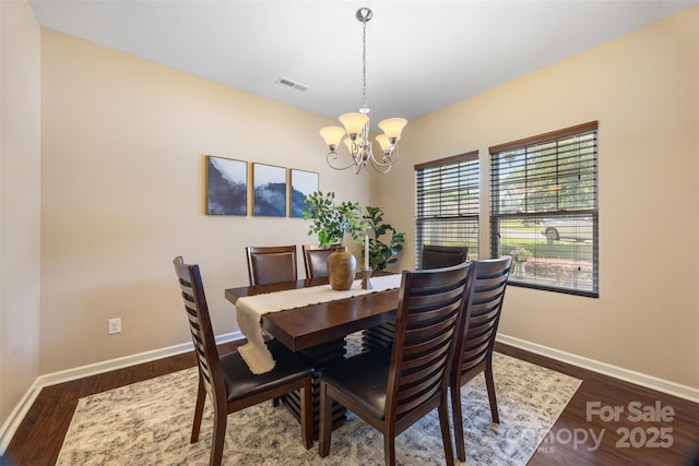 352 Nantucket Way, Rock Hill, SC 29732 - dining area featuring a chandelier, dark wood-style floors, and baseboards