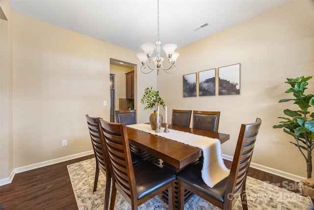 352 Nantucket Way, Rock Hill, SC 29732 - dining area with dark wood finished floors, a chandelier, and baseboards