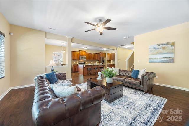 352 Nantucket Way, Rock Hill, SC 29732 - living room featuring a ceiling fan, baseboards, dark wood-style flooring, and stairway