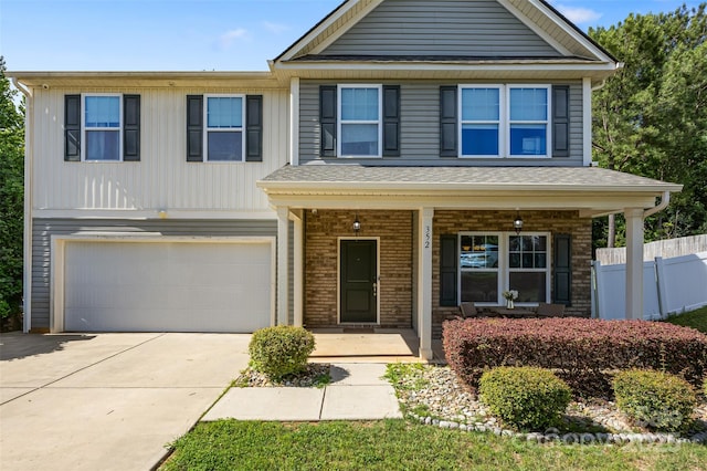 352 Nantucket Way, Rock Hill, SC 29732 - view of front of property featuring a garage, concrete driveway, covered porch, and brick siding