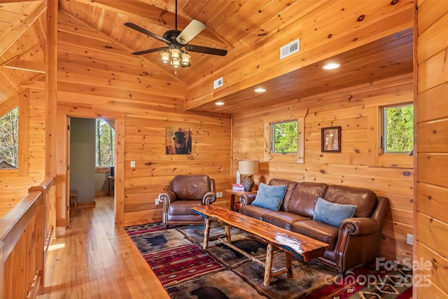 1600 Pisgah Preserve Dr, Nebo, NC 28761 - living room with hardwood / wood-style flooring, lofted ceiling, ceiling fan, and visible vents