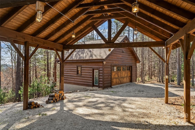 1600 Pisgah Preserve Dr, Nebo, NC 28761 - view of patio / terrace featuring gravel driveway and a garage