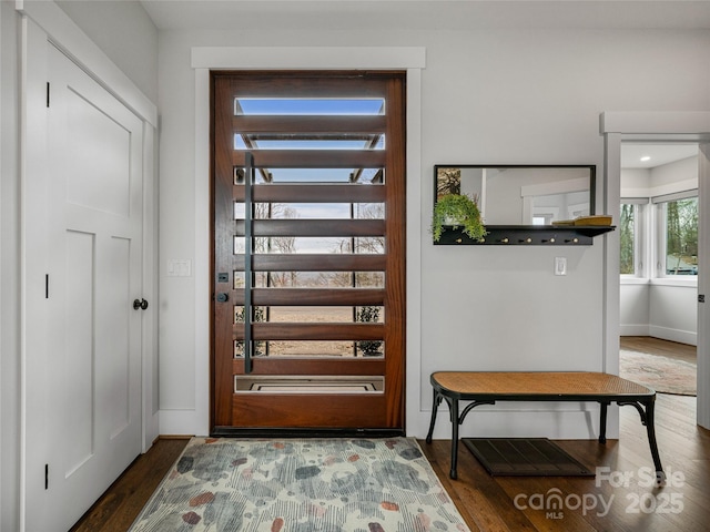 322 Windswept Dr, Asheville, NC 28801 - entryway with baseboards and wood finished floors