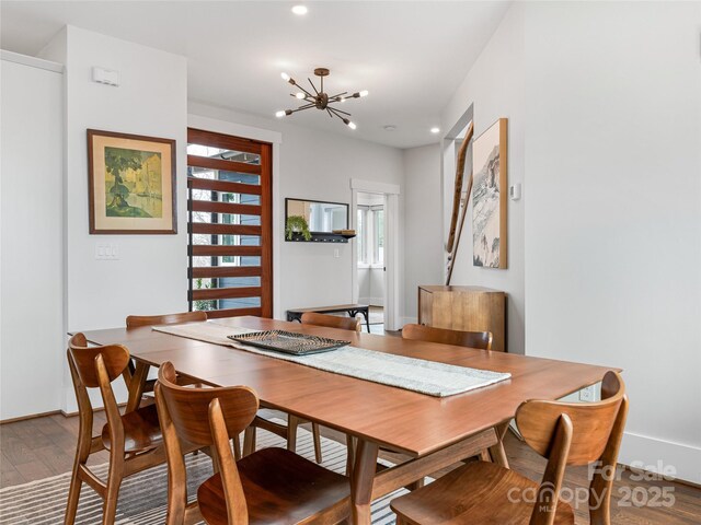 322 Windswept Dr, Asheville, NC 28801 - dining space with an inviting chandelier, recessed lighting, and wood finished floors