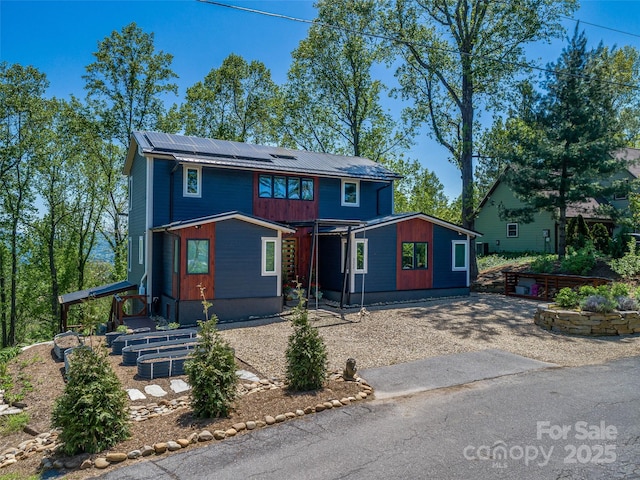 322 Windswept Dr, Asheville, NC 28801 - view of front of home featuring roof mounted solar panels