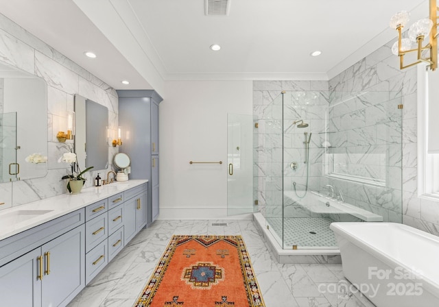 300 Mammoth Oaks Dr, Charlotte, NC 28270 - bathroom with marble finish flooring, ornamental molding, recessed lighting, a soaking tub, and a marble finish shower