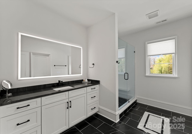 300 Mammoth Oaks Dr, Charlotte, NC 28270 - bathroom featuring vanity, a shower stall, and baseboards