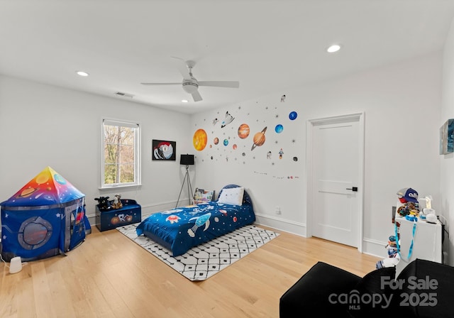 300 Mammoth Oaks Dr, Charlotte, NC 28270 - bedroom with wood finished floors, recessed lighting, ceiling fan, and baseboards
