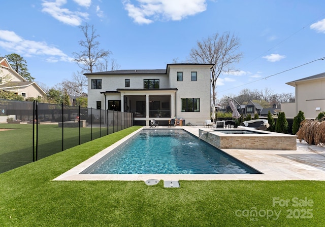 300 Mammoth Oaks Dr, Charlotte, NC 28270 - back of property featuring a sunroom, stucco siding, a patio area, and a pool with connected hot tub