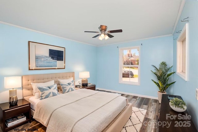 400 E 1st St, Cherryville, NC 28021 - bedroom with wood finished floors, crown molding, a ceiling fan, and baseboards