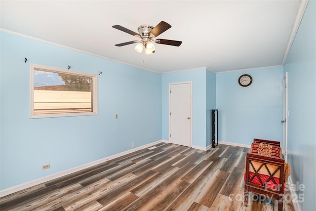 400 E 1st St, Cherryville, NC 28021 - unfurnished room with dark wood finished floors, baseboards, ornamental molding, and a ceiling fan