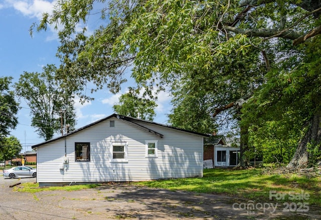 400 E 1st St, Cherryville, NC 28021 - view of home's exterior with a lawn