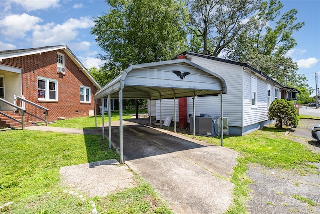 400 E 1st St, Cherryville, NC 28021 - view of parking / parking lot featuring driveway and a carport
