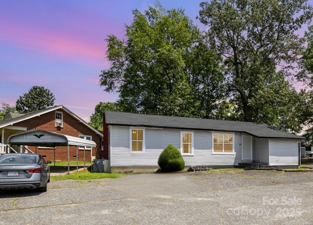 400 E 1st St, Cherryville, NC 28021 - view of front of house featuring asphalt driveway and a detached carport