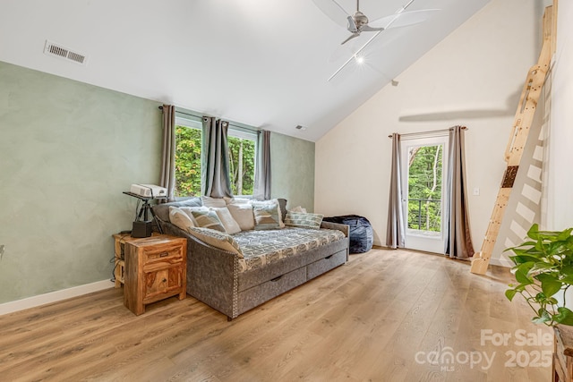 47 Webb Cove Rd, Asheville, NC 28804 - living room featuring visible vents, baseboards, ceiling fan, light wood-type flooring, and high vaulted ceiling
