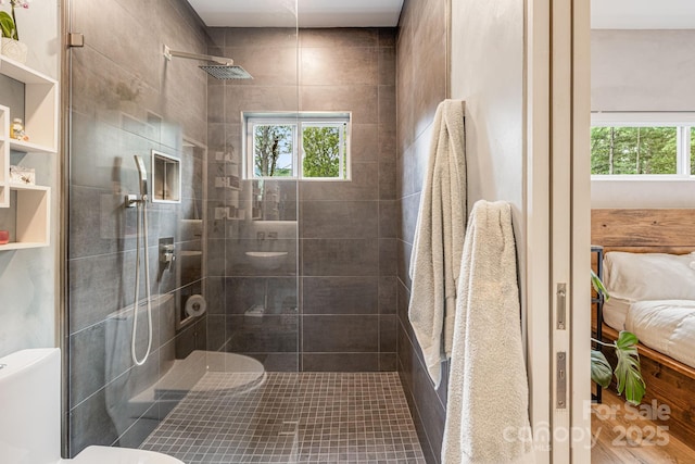 47 Webb Cove Rd, Asheville, NC 28804 - ensuite bathroom featuring toilet, connected bathroom, and tiled shower