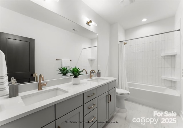 bathroom featuring double vanity, shower / bathtub combination with curtain, toilet, marble finish floors, and recessed lighting