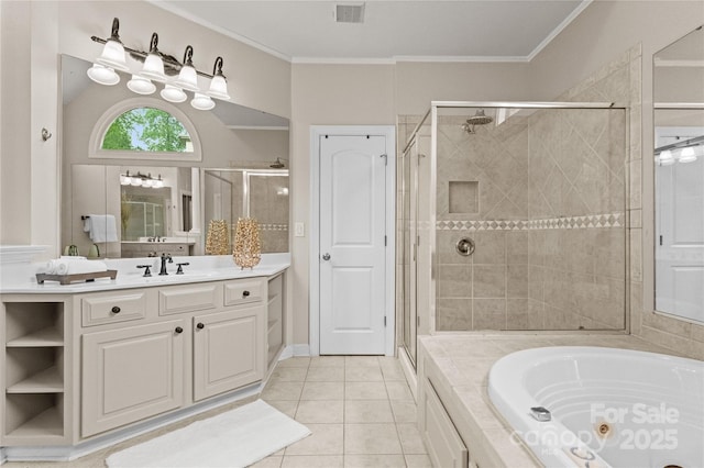 full bath with a tub with jets, crown molding, tile patterned floors, a stall shower, and visible vents