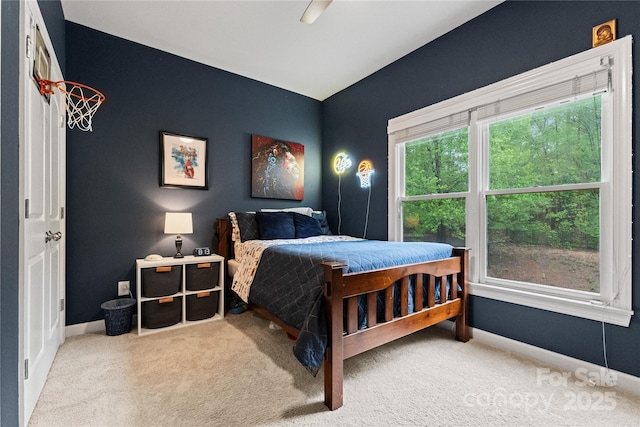 bedroom with carpet, baseboards, and ceiling fan