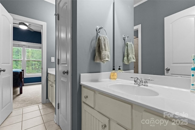 bathroom with tile patterned floors and vanity