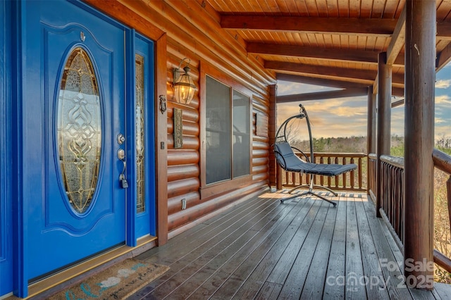 entrance to property with a porch
