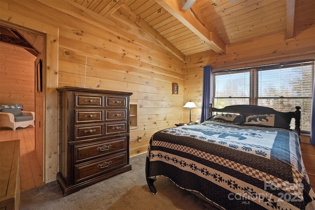 bedroom featuring dark colored carpet, wood ceiling, lofted ceiling with beams, and wooden walls