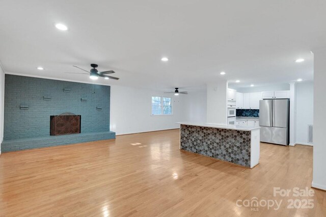 2750 Morgan Rd, Gold Hill, NC 28071 - living area with recessed lighting, light wood-style flooring, and ceiling fan