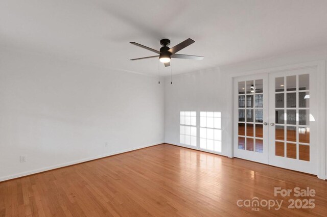 2750 Morgan Rd, Gold Hill, NC 28071 - spare room with ceiling fan, french doors, baseboards, and wood finished floors