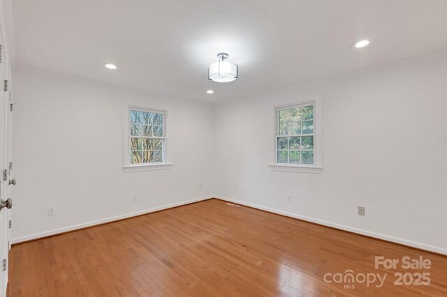 2750 Morgan Rd, Gold Hill, NC 28071 - spare room featuring recessed lighting, baseboards, and wood finished floors