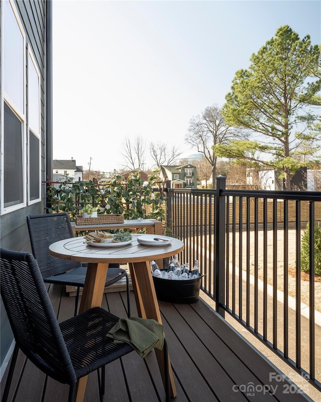 deck with outdoor dining space