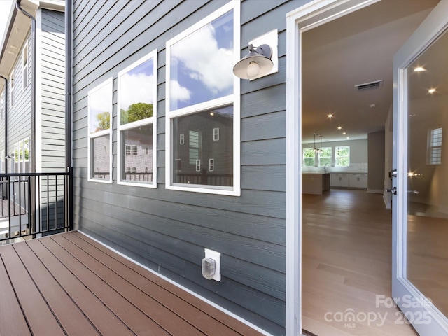 wooden terrace with visible vents