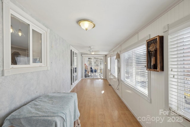 hallway featuring light wood-style flooring