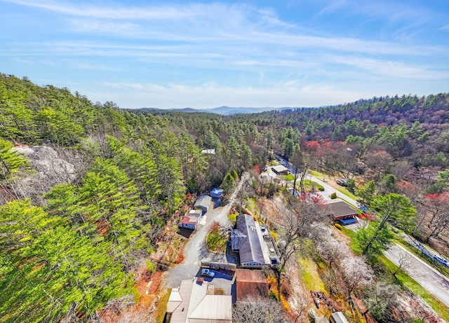 aerial view featuring a view of trees