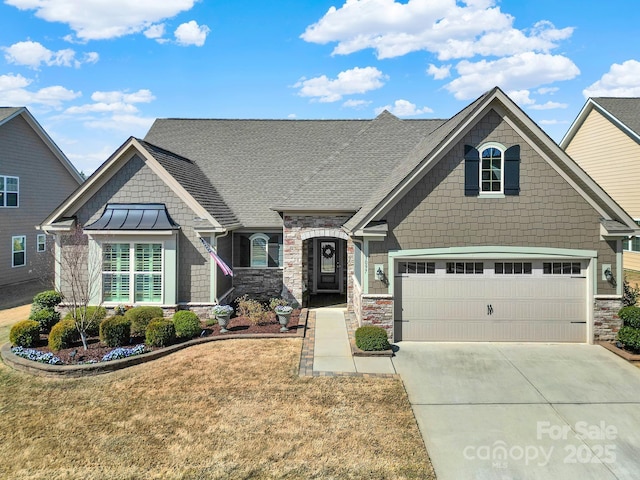 3097 Arches Bluff Cir, Lancaster, SC 29720 - view of front of house with driveway, stone siding, a shingled roof, a front yard, and an attached garage