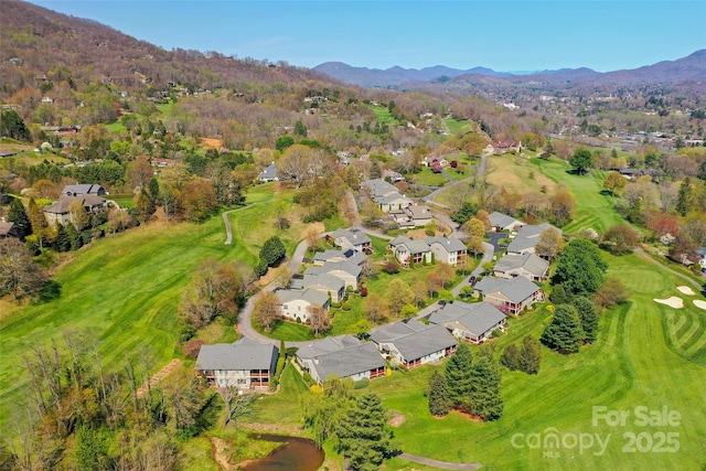 bird's eye view featuring a residential view, a mountain view, and golf course view