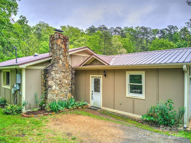 731 Old Fort Rd, Fairview, NC 28730 - view of front of home featuring metal roof and a chimney