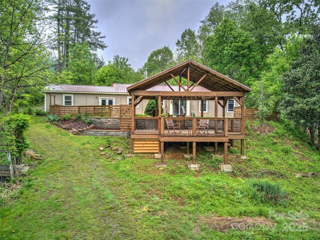 731 Old Fort Rd, Fairview, NC 28730 - back of house with metal roof, a gazebo, and a deck