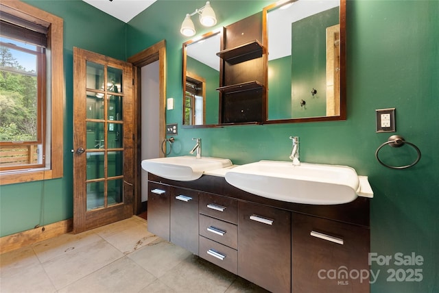 731 Old Fort Rd, Fairview, NC 28730 - bathroom featuring double vanity and tile patterned floors