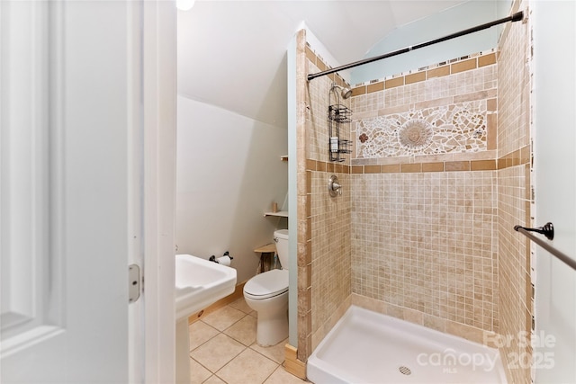 731 Old Fort Rd, Fairview, NC 28730 - full bath featuring tile patterned floors, toilet, a stall shower, and vaulted ceiling
