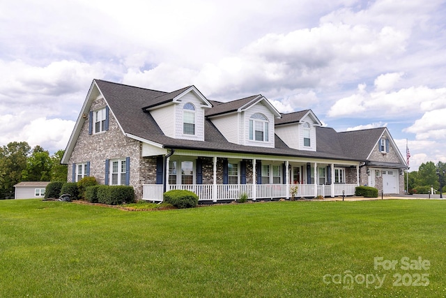 727 Jenkins Valley Rd, Alexander, NC 28701 - new england style home with a porch, a front lawn, brick siding, and roof with shingles