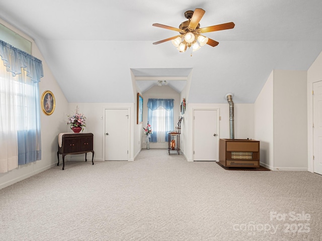 727 Jenkins Valley Rd, Alexander, NC 28701 - bonus room with lofted ceiling, ceiling fan, carpet floors, and a wood stove