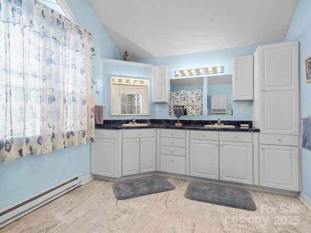 727 Jenkins Valley Rd, Alexander, NC 28701 - full bathroom featuring a baseboard heating unit, lofted ceiling, double vanity, and marble finish flooring