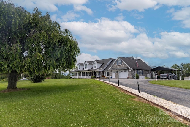 727 Jenkins Valley Rd, Alexander, NC 28701 - view of front of home featuring a front lawn, stone siding, and driveway