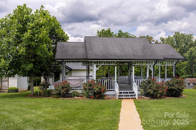 727 Jenkins Valley Rd, Alexander, NC 28701 - view of front of property with a shingled roof and a front yard
