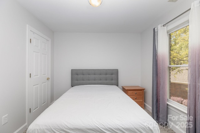 bedroom with baseboards