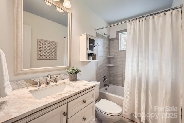 bathroom with toilet, vanity, and shower / tub combo with curtain