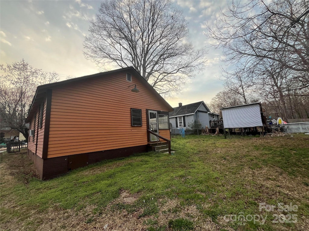 1128 Rosehill Dr, Lincolnton, NC 28092 - exterior space with entry steps and a yard