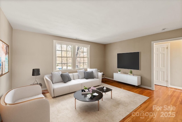 103 S Laurel Ave, Charlotte, NC 28207 - living area with wood finished floors and baseboards