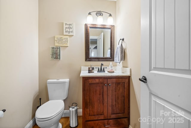 1263 Waterford Dr, Hickory, NC 28602 - bathroom featuring vanity, toilet, and baseboards